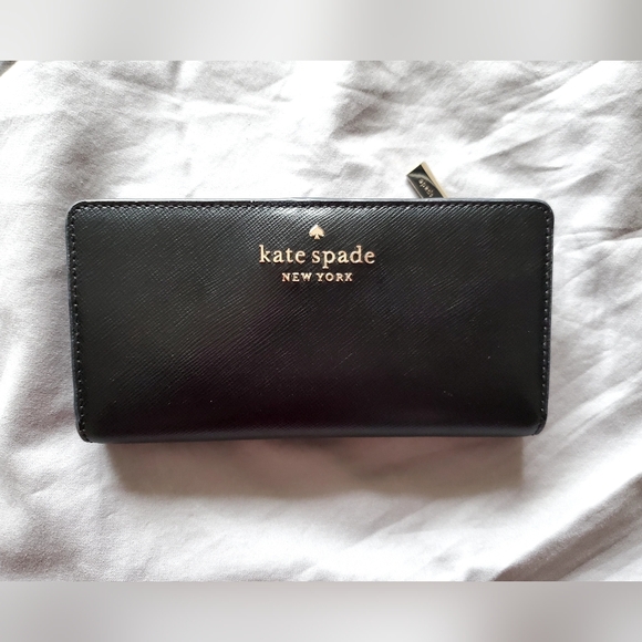 kate spade Handbags - BlackMadison Large Slim Bifold Wallet